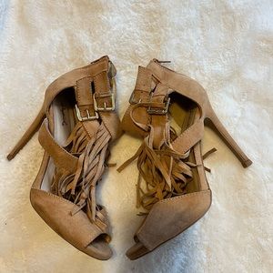 Fringe heels gently used